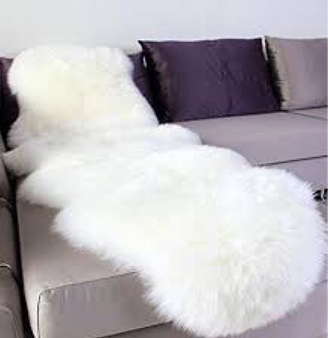 Ophanie Ultra-Luxurious Fluffy Sheepskin Rug: A Soft Faux…